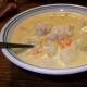 Soup with melted cheese and chicken breast